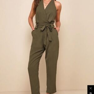 Brand new olive green romper with halter neck.